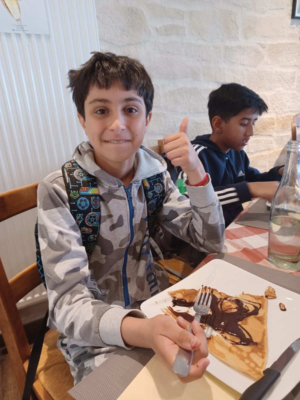 Seniors enjoying crepes in France