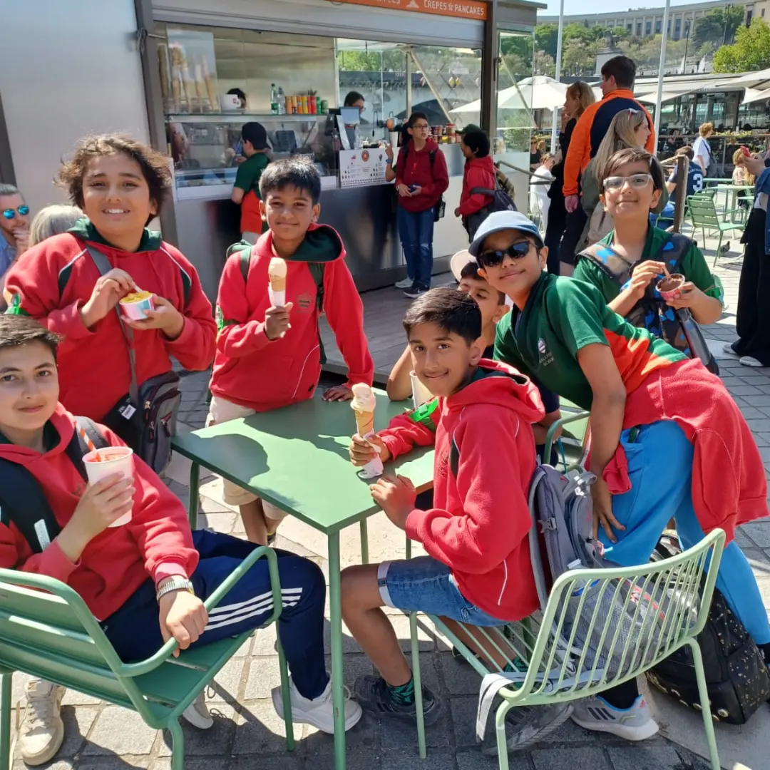 Pupils enjoying ice cream in Paris, France
